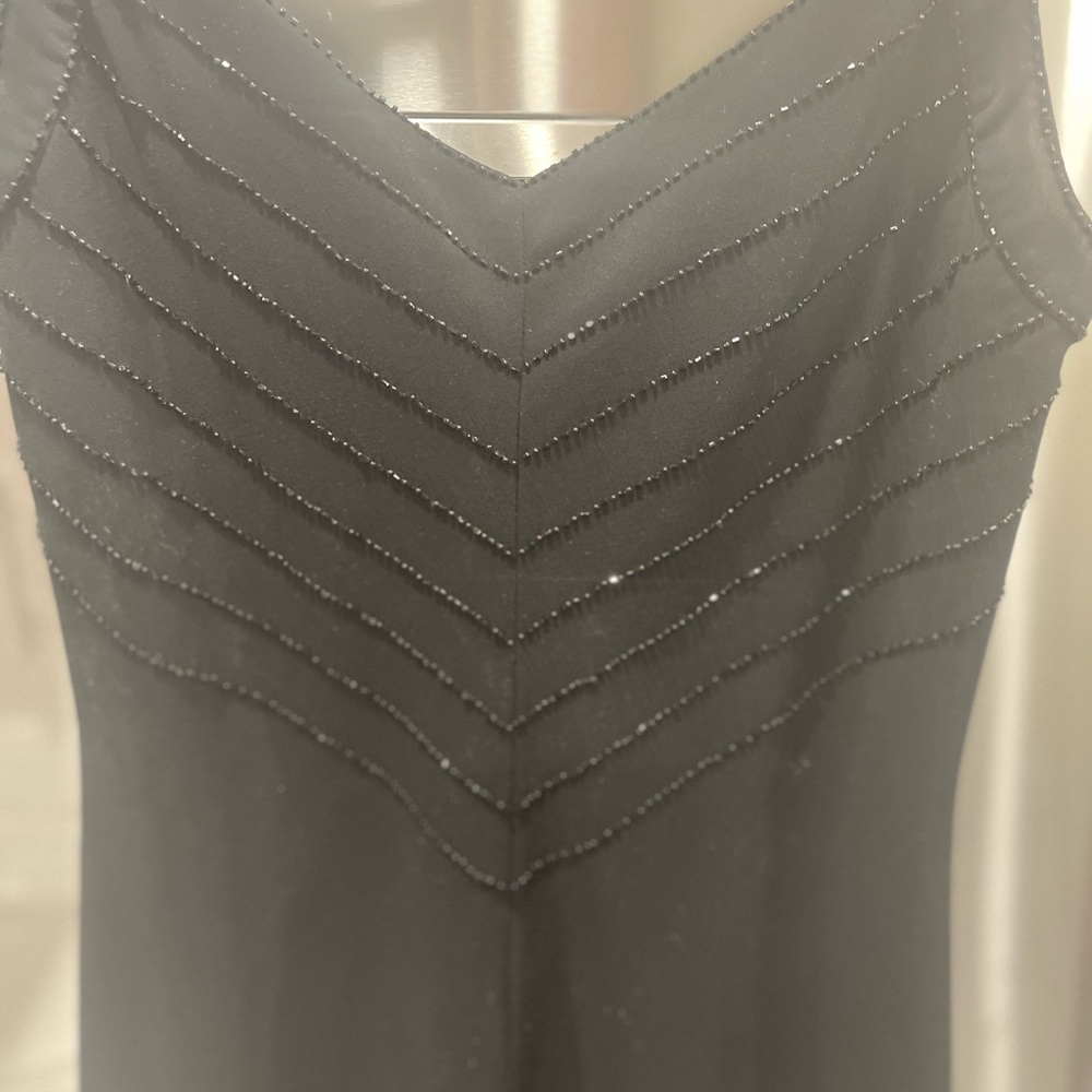 Evan Picone woman’s beaded top dress. Mid calf.